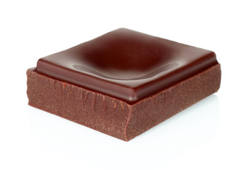 Dark chocolate piece isolated on white background