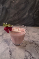 Healthy fresh strawberry smoothie or milkshake