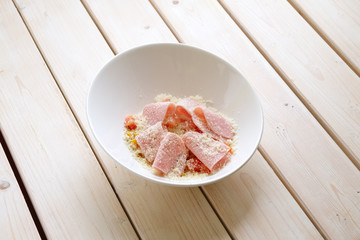 Salad with ham, corn, tomato and parmesan