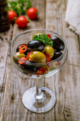 Kalamata olives on wooden table