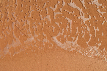 Soft wave of sea on sandy beach