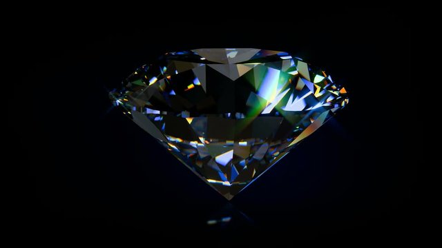 Sparkling blue round cut diamond rotating on black background. Seamless loop 3D animation