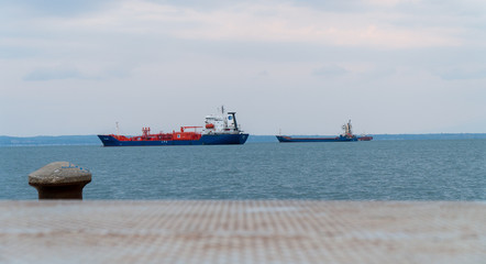 Fototapeta premium Thessaloniki / Greece 28 march 2019 : view of thessaloniki sea with some ships inside and clear from clouds weather and good temperture
