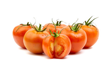 Tomato closeup on white background. Selective focus and crop fragment