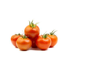 Tomato closeup on white background. Selective focus and crop fragment