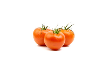 Tomato closeup on white background. Selective focus and crop fragment
