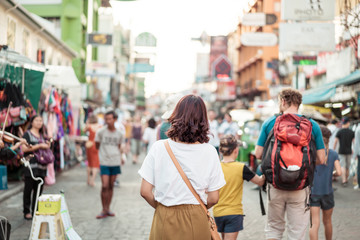 Happy and Beautiful Asian woman traveling at Khao Sarn Road, Thailand