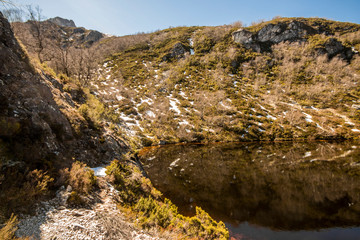 Fototapeta na wymiar Asturias, Spain. The Laguna Fonda or Honda (Deep Lake) in the Muniellos Nature Reserve (Reserva natural integral)
