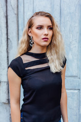 Fototapeta premium Attractive lady with blond hair and bright makeup