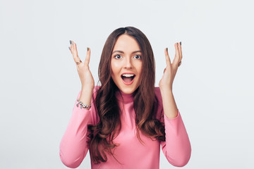 Surprised amazing woman isolated on white background