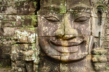 Fototapeta na wymiar Bayon statue with smile face in Angkor Thom temple