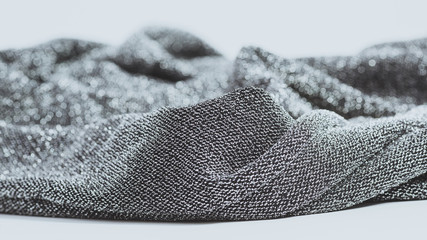 shiny fabric of silver and black threads