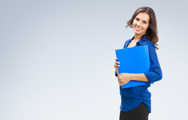 Businesswoman with blue folder