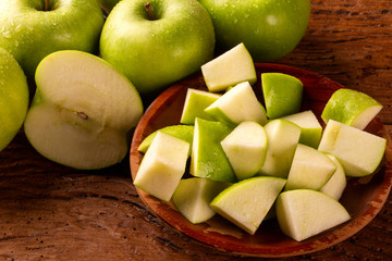 Ripe green apples on table close up
