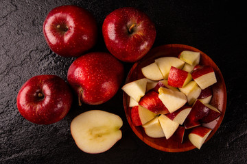 Ripe red apples on table close up