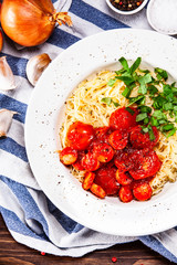 Pasta with tomato sauce and sausage