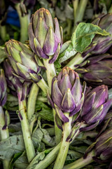 Fresh local artichokes and other vegetables at a Mercato Centrale market in Florence, Italy. It was opened in 1874.