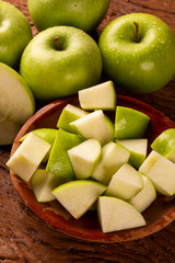 Ripe green apples on table close up