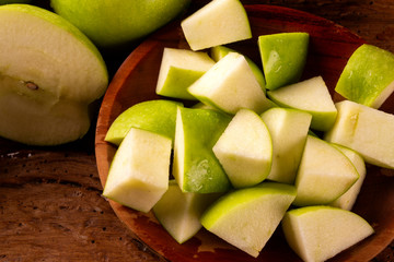 Ripe green apples on table close up