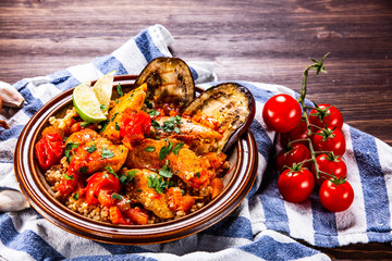 Roasted meat, groats and vegetables