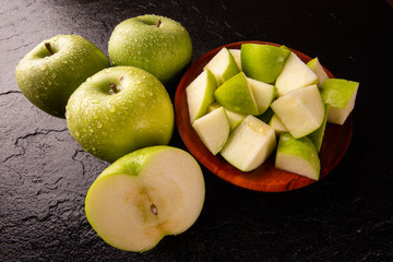 Ripe green apples on table close up