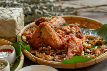 Garlic fried chicken over a wooden table
