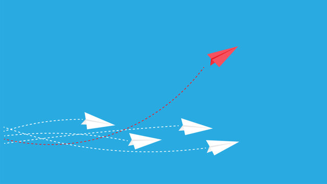 Red plane changes direction. New idea, change, trend, courage, creative decision, innovation and unique concept of the path.