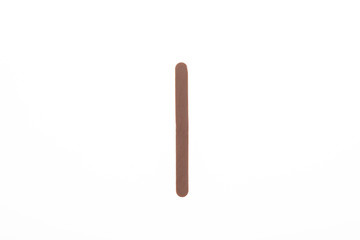 Wooden ice cream stick on white background isolated, flat lay top