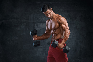 Muscular Men Exercise With Weights