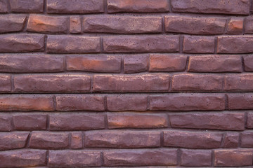 Background of purple bricks. Construction Materials