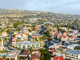 Obraz premium Aerial view of San Clemente beach and coastline before sunset time . San Clemente city in Orange County, California, USA. Travel destination in the South West Coast. Famous beach for surfer.