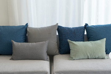 colorful cushions in a spacious living room interior 