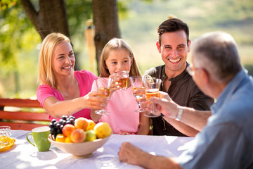 Family in nature having a picnic.