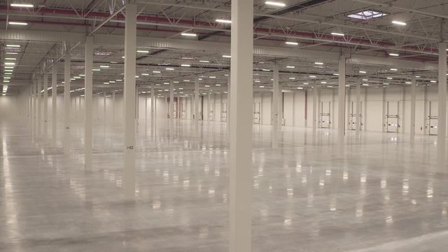 Warehouse interior empty smooth footage from dolly shot