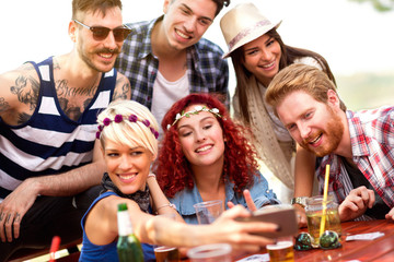 Picnickers making selfie