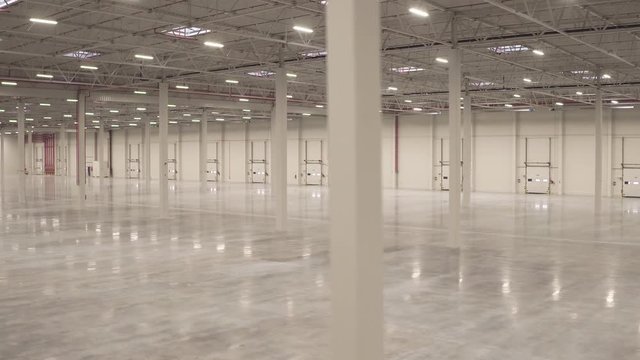 Warehouse interior empty smooth footage from dolly shot