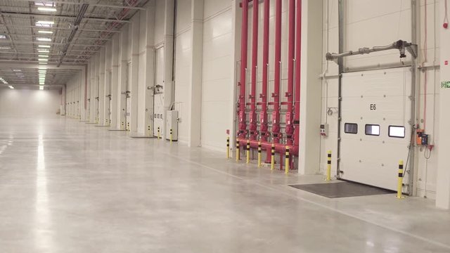 Warehouse interior empty smooth footage from dolly shot