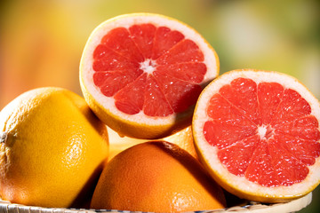 Freshly red grapefruit on wooden background