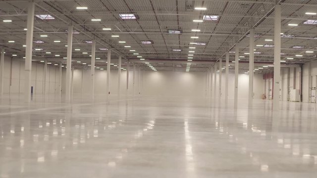 Warehouse interior empty smooth footage from dolly shot