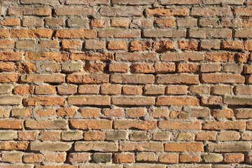 An old brick wall. Background of red bricks. Brick wall texture