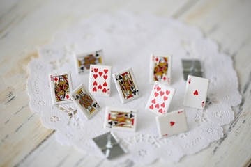 Little cute metal cards as a gambling concept.