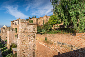 Fototapeta na wymiar Malaga Alcazaba walls, towers, gates and gardens of the castle