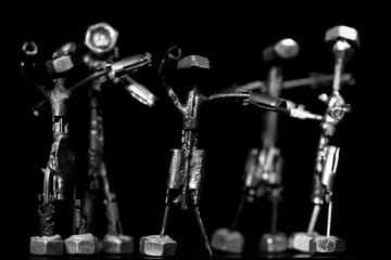 Group of miniature iron figurines made out of metal and bolds