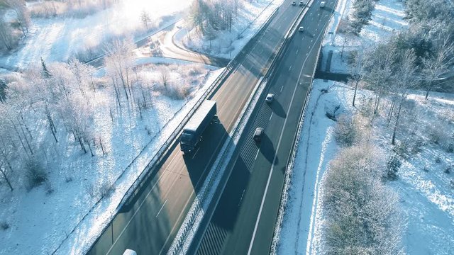Truck Driving Winter Ice Road, Highway Aerial View