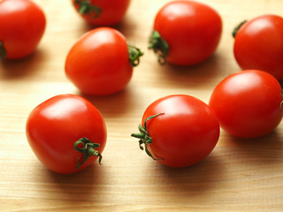 tomatoes on a wooden table