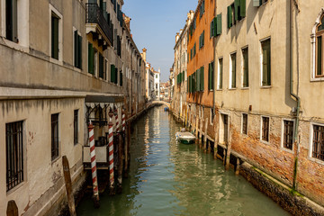 Fototapeta na wymiar Italy, Venice, view of canals among the typical Venetian houses.