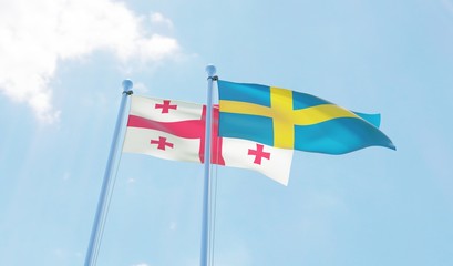 Georgia and Sweden, two flags waving against blue sky. 3d image