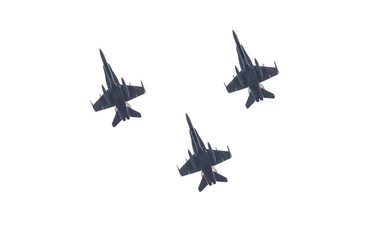 Group of three army fighter jets shot from below. Silhouettes of military war aircrafts with bombs and missiles ready to attack isolated on white background.