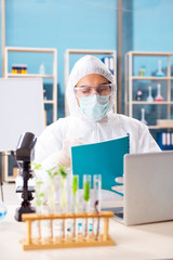 Male biotechnology scientist chemist working in the lab