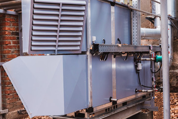 Side view of the commercial central air handling unit with cooling coil